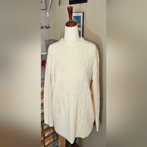 A New Day woman's long-sleeved cream sweater